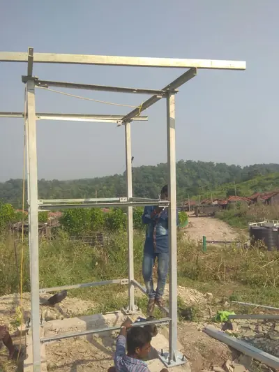 Steel tank stand frame being assembled